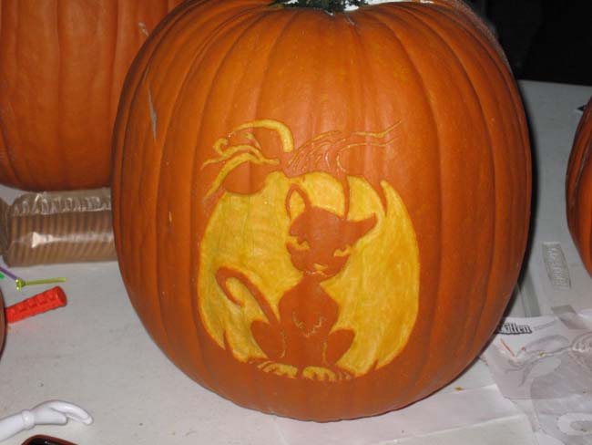 cat on a pumpkin carving